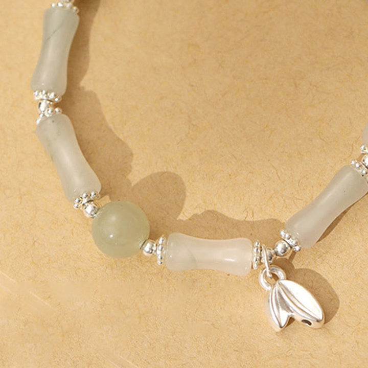 Braccialetto portafortuna con ciondolo in bambù e giada naturale Tianshan in argento sterling 925 Buddha Stones