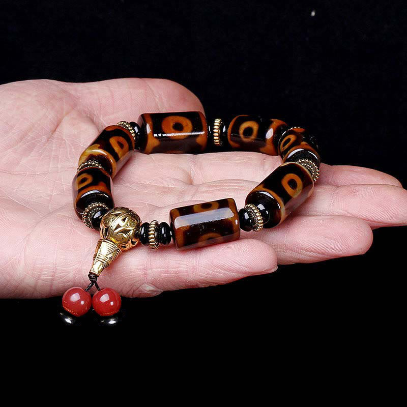 Braccialetto con ciondolo della fortuna con perline Dzi a nove occhi tibetani Buddha Stones