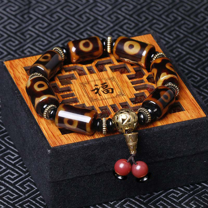 Braccialetto con ciondolo della fortuna con perline Dzi a nove occhi tibetani Buddha Stones