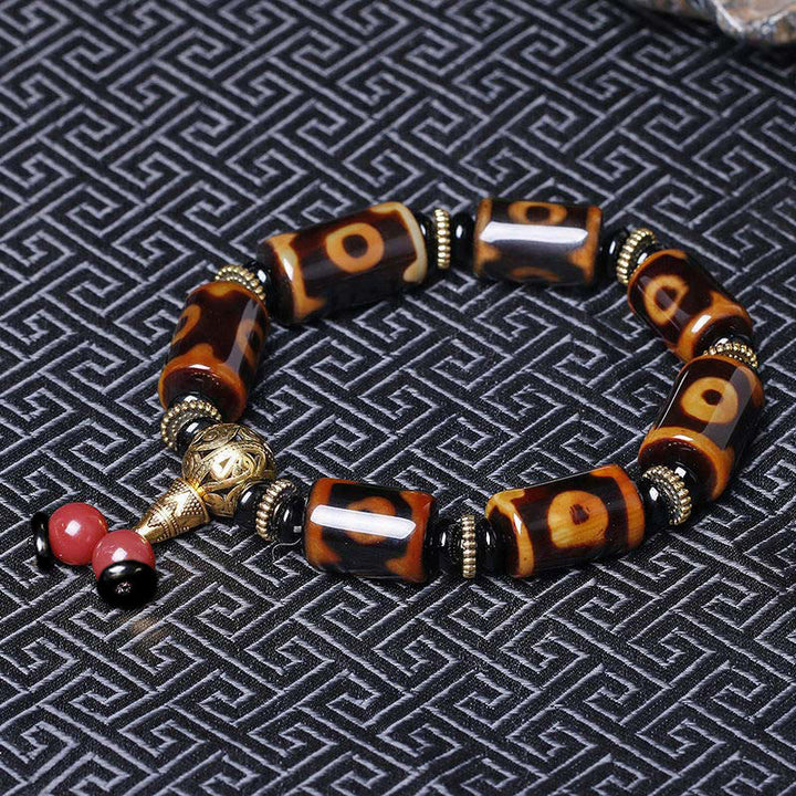 Braccialetto con ciondolo della fortuna con perline Dzi a nove occhi tibetani Buddha Stones - image 2