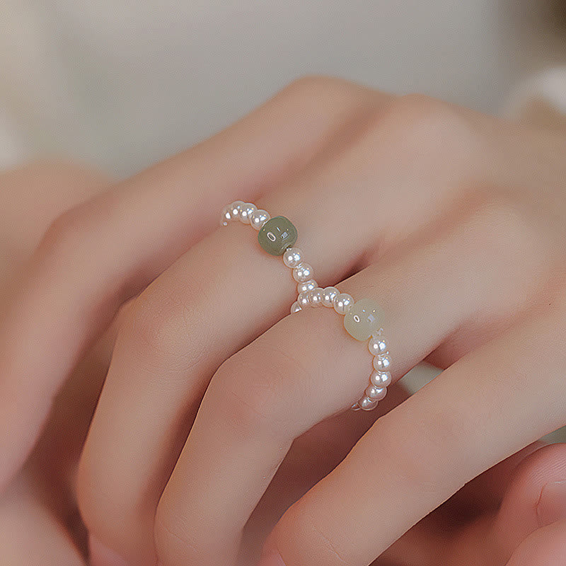Anello portafortuna con perle di giada rotonde e Buddha Stones