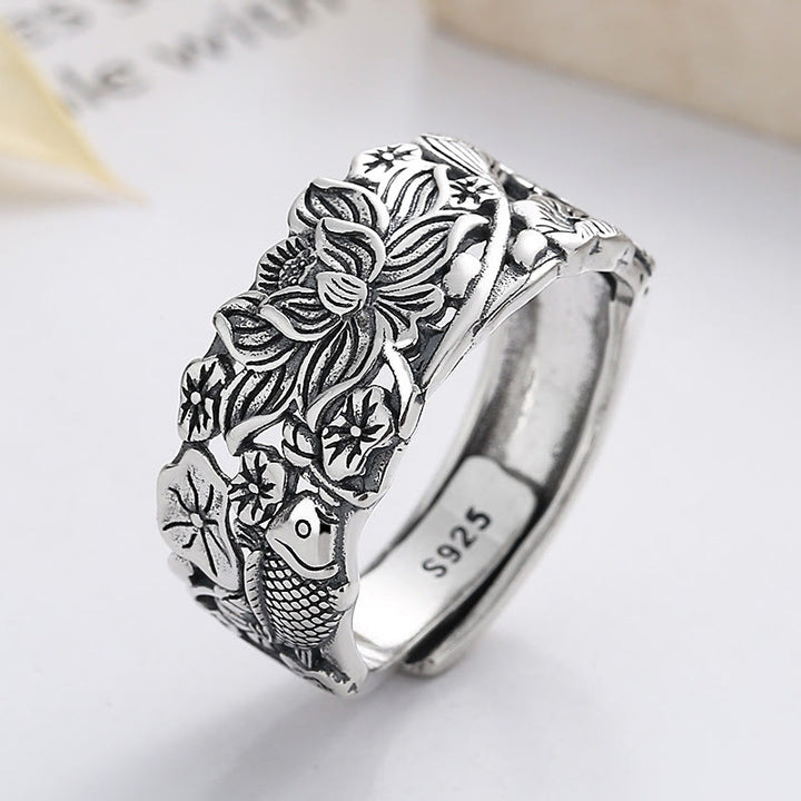 Anello della prosperità con fiore di loto e pesce koi in argento sterling 925 Buddha Stones