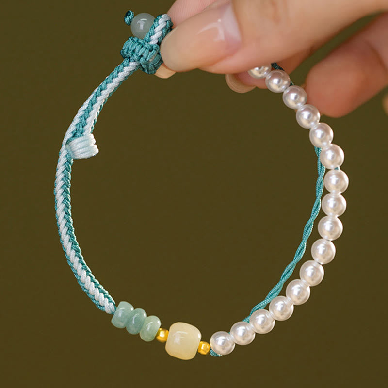Bracciale Buddha Stones in argento sterling 925 con giada Hetian e corda intrecciata con perle e abbondanza