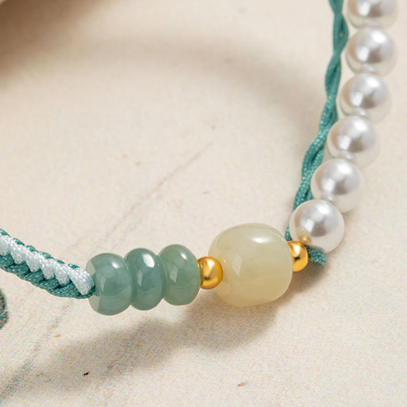 Bracciale Buddha Stones in argento sterling 925 con giada Hetian e corda intrecciata con perle e abbondanza