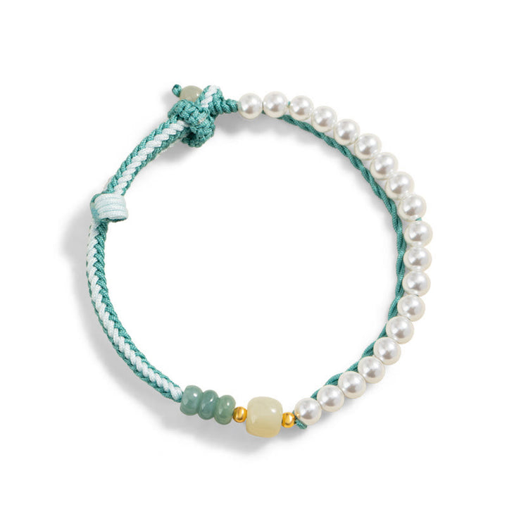 Bracciale Buddha Stones in argento sterling 925 con giada Hetian e corda intrecciata con perle e abbondanza