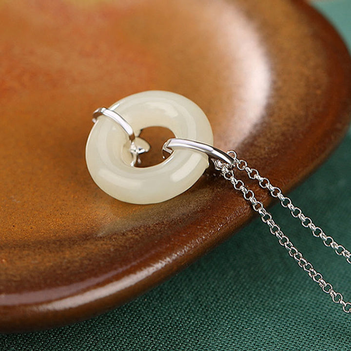 Collana con ciondolo a forma di fiore con fibbia della pace in giada Hetian, argento sterling 925, Buddha Stones