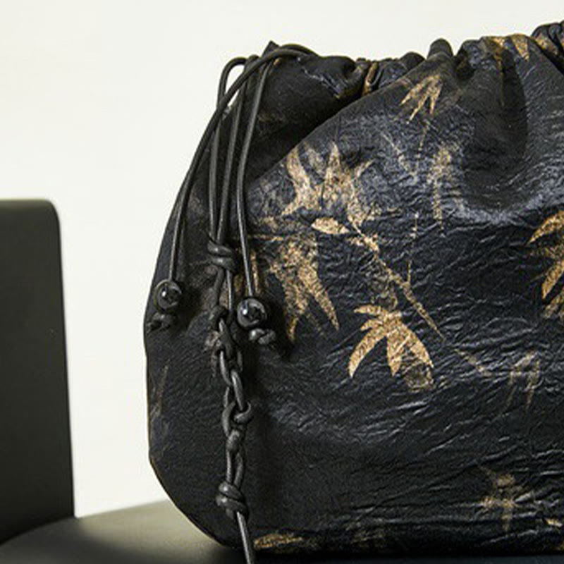 Borsa a tracolla in acetato con motivo a foglie di bambù giallo Buddha Stones