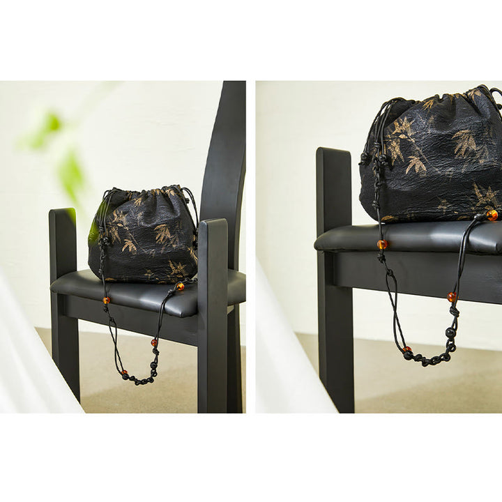 Borsa a tracolla in acetato con motivo a foglie di bambù giallo Buddha Stones