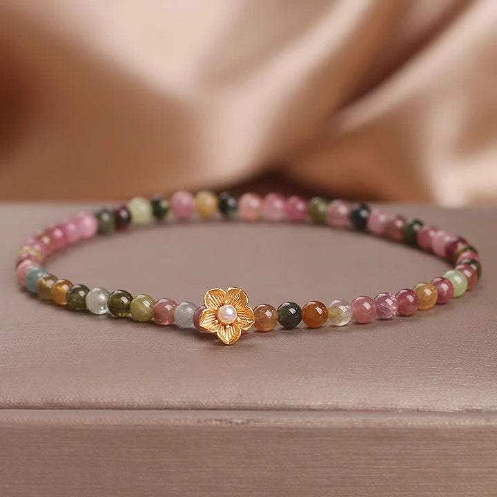 Braccialetto positivo con fiori di tormalina colorata Buddha Stones