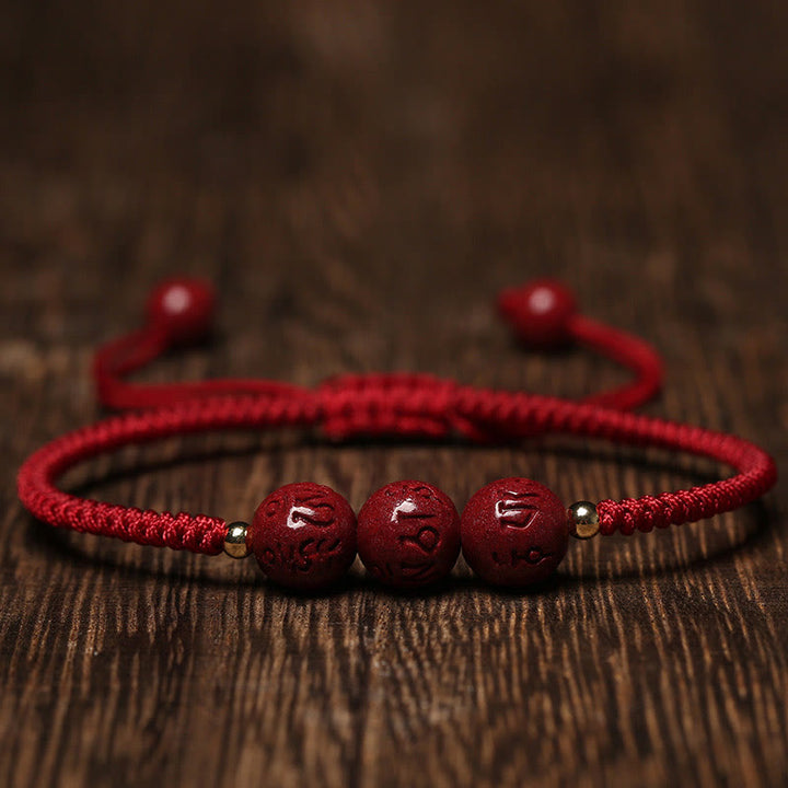 Buddha Stones Cinnabar fatto a mano Om Mani Padme Hum Perline incise Bracciale intrecciato per la benedizione