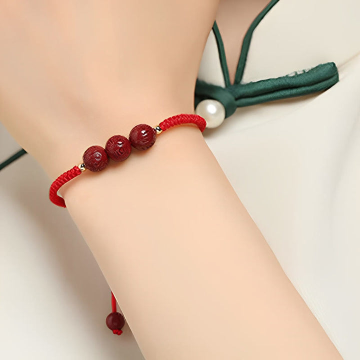Buddha Stones Cinnabar fatto a mano Om Mani Padme Hum Perline incise Bracciale intrecciato per la benedizione