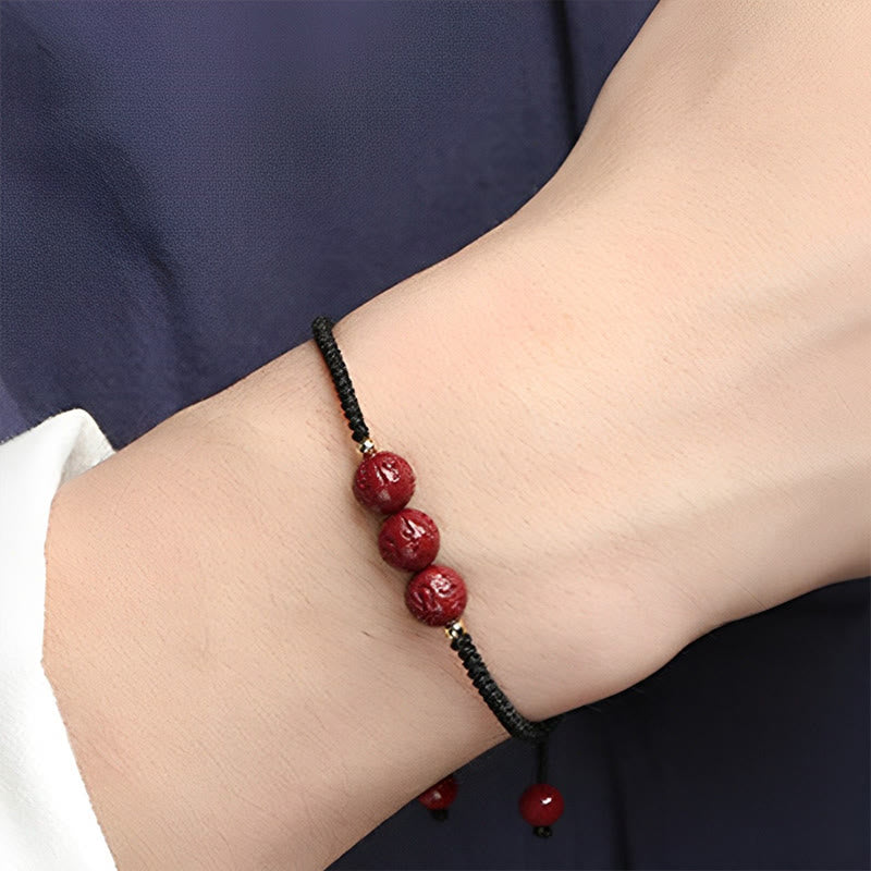 Buddha Stones Cinnabar fatto a mano Om Mani Padme Hum Perline incise Bracciale intrecciato per la benedizione