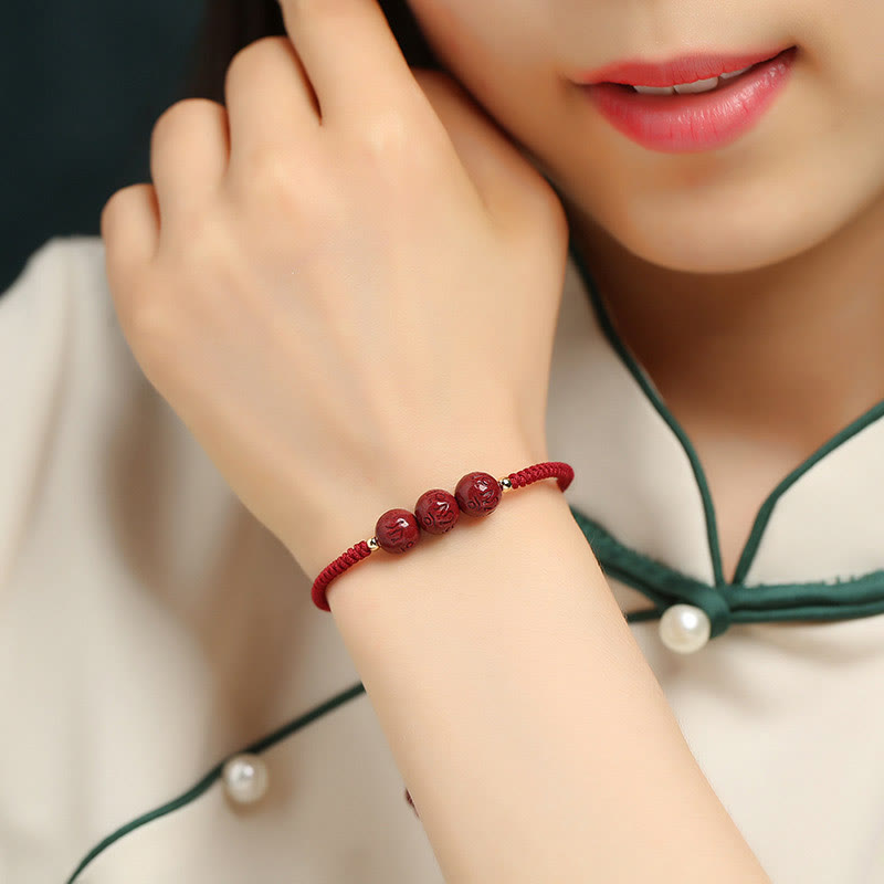 Buddha Stones Cinnabar fatto a mano Om Mani Padme Hum Perline incise Bracciale intrecciato per la benedizione