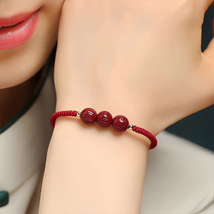 Buddha Stones Cinnabar fatto a mano Om Mani Padme Hum Perline incise Bracciale intrecciato per la benedizione