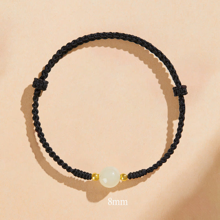 Bracciale intrecciato con perline di giada rotonde fatte a mano con Buddha Stones e portafortuna