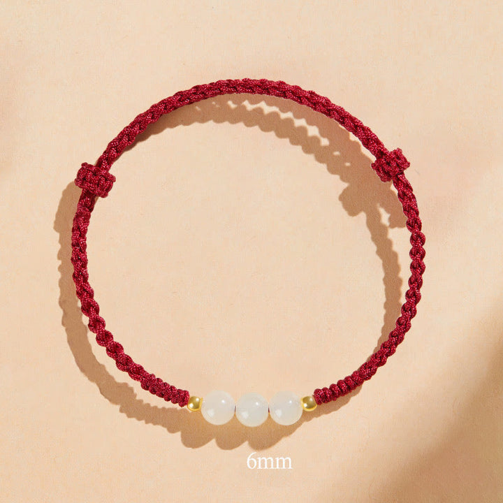 Bracciale intrecciato con perline di giada rotonde fatte a mano con Buddha Stones e portafortuna