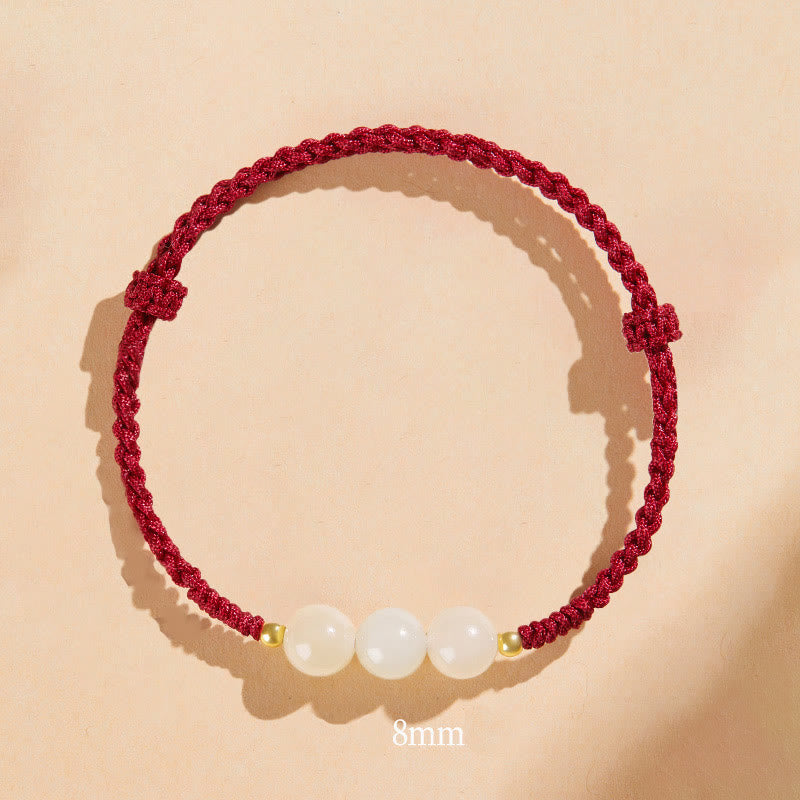 Bracciale intrecciato con perline di giada rotonde fatte a mano con Buddha Stones e portafortuna
