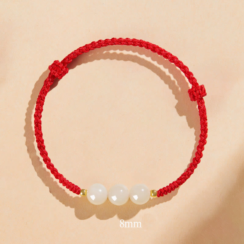 Bracciale intrecciato con perline di giada rotonde fatte a mano con Buddha Stones e portafortuna