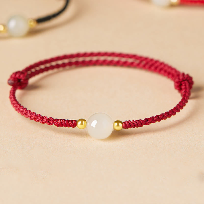 Bracciale intrecciato con perline di giada rotonde fatte a mano con Buddha Stones e portafortuna