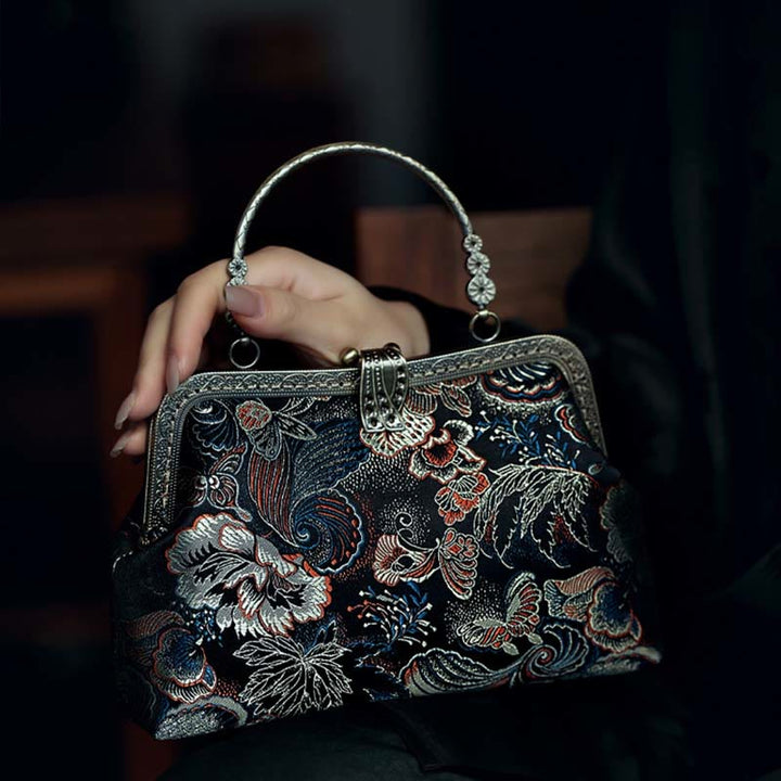 Borsa a mano con manico in metallo e fiori a farfalla con Buddha Stones