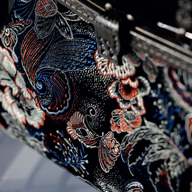 Borsa a mano con manico in metallo e fiori a farfalla con Buddha Stones