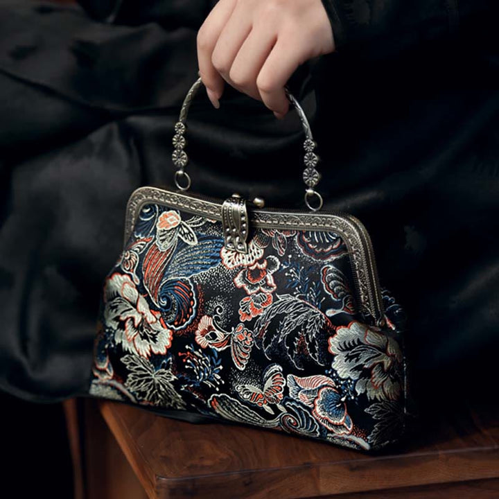 Borsa a mano con manico in metallo e fiori a farfalla con Buddha Stones