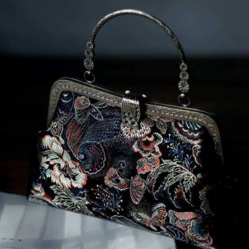 Borsa a mano con manico in metallo e fiori a farfalla con Buddha Stones