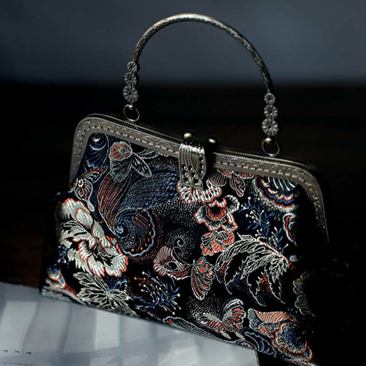 Borsa a mano con manico in metallo e fiori a farfalla con Buddha Stones