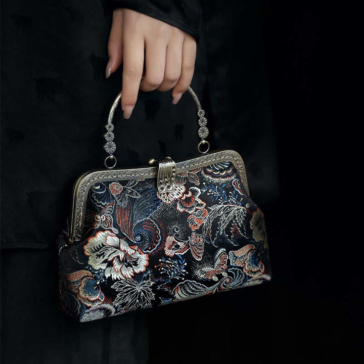 Borsa a mano con manico in metallo e fiori a farfalla con Buddha Stones
