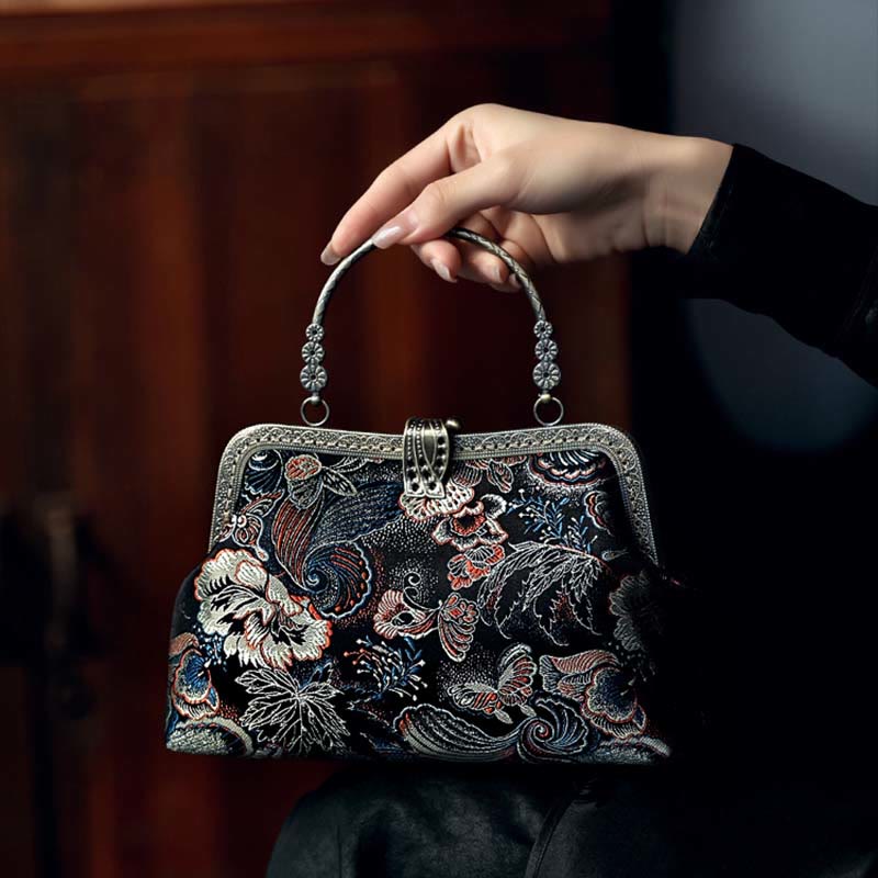 Borsa a mano con manico in metallo e fiori a farfalla con Buddha Stones