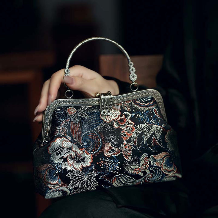 Borsa a mano con manico in metallo e fiori a farfalla con Buddha Stones
