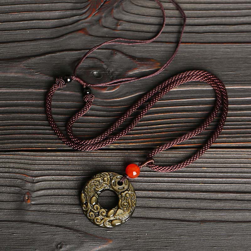 Collana con Buddha Stones in ossidiana, ciondolo in rame, ciondolo in oro ...