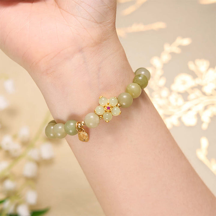 Braccialetto portafortuna con ciondolo a forma di carattere Fu con fiore di giada verde Buddha Stones