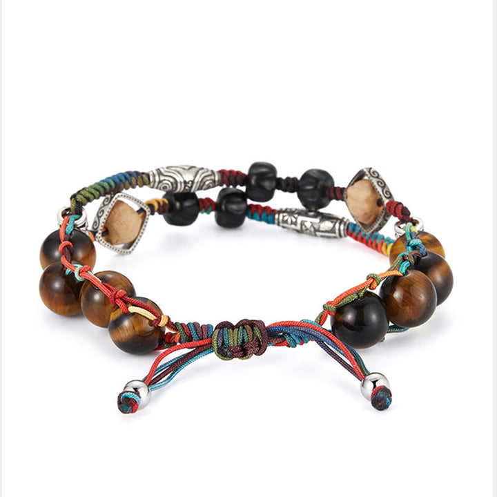 Braccialetto fatto a mano con coraggio Buddha Stones in argento sterling 925 con occhio di tigre e semi di Bodhi