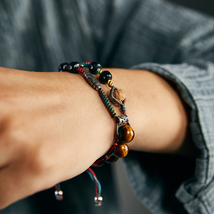 Braccialetto fatto a mano con coraggio Buddha Stones in argento sterling 925 con occhio di tigre e semi di Bodhi