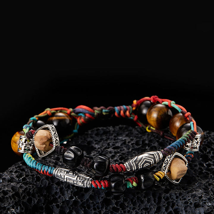 Braccialetto fatto a mano con coraggio Buddha Stones in argento sterling 925 con occhio di tigre e semi di Bodhi - 19 cm adatto per circonferenza del polso 17 cm - image 0