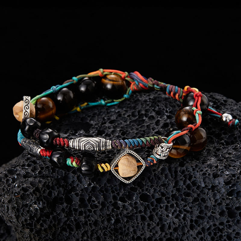 Braccialetto fatto a mano con coraggio Buddha Stones in argento sterling 925 con occhio di tigre e semi di Bodhi