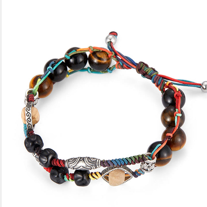 Braccialetto fatto a mano con coraggio Buddha Stones in argento sterling 925 con occhio di tigre e semi di Bodhi
