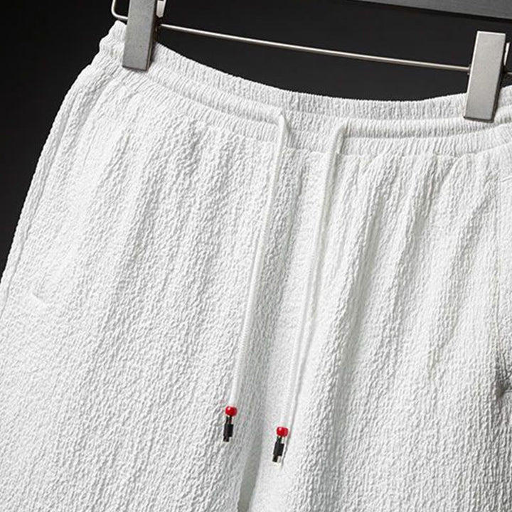 Set da uomo Buddha Stones 2 pezzi tinta unita con bottoni e pantaloni a mezza manica
