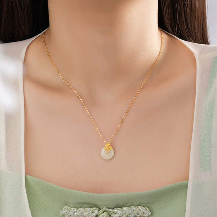 Collana con ciondolo Buddha Stones in argento sterling 925, giada Hetian, foglie di ginkgo e prosperità