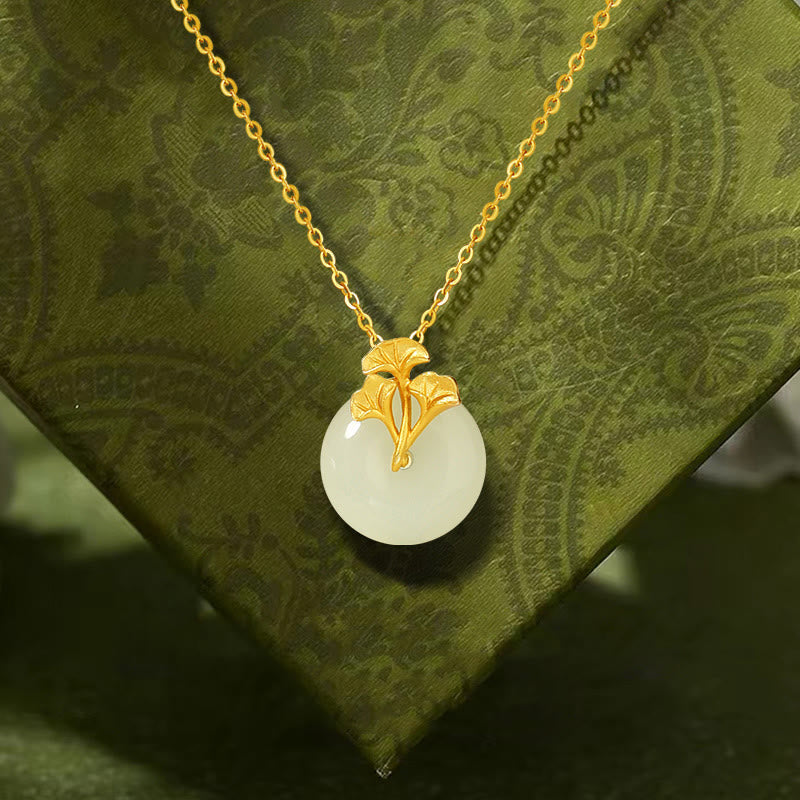 Collana con ciondolo Buddha Stones in argento sterling 925, giada Hetian, foglie di ginkgo e prosperità