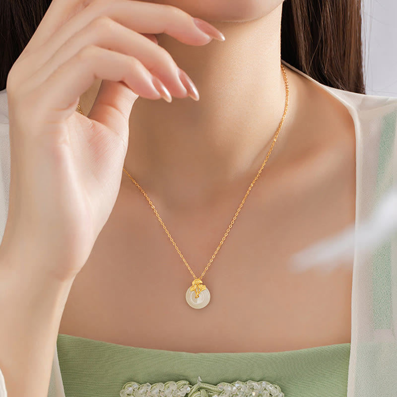 Collana con ciondolo Buddha Stones in argento sterling 925, giada Hetian, foglie di ginkgo e prosperità