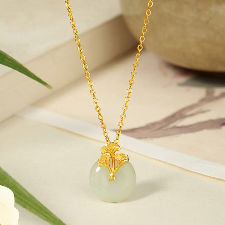 Collana con ciondolo Buddha Stones in argento sterling 925, giada Hetian, foglie di ginkgo e prosperità