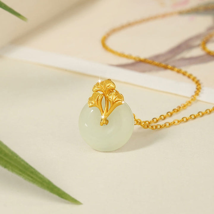 Collana con ciondolo Buddha Stones in argento sterling 925, giada Hetian, foglie di ginkgo e prosperità