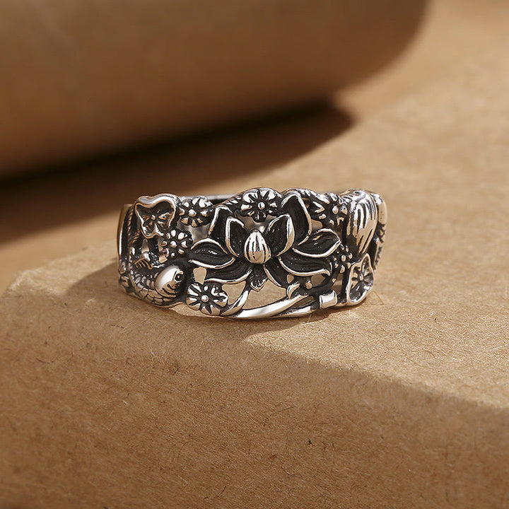 Anello dell'illuminazione con simbolo di loto e pesce koi Buddha Stones