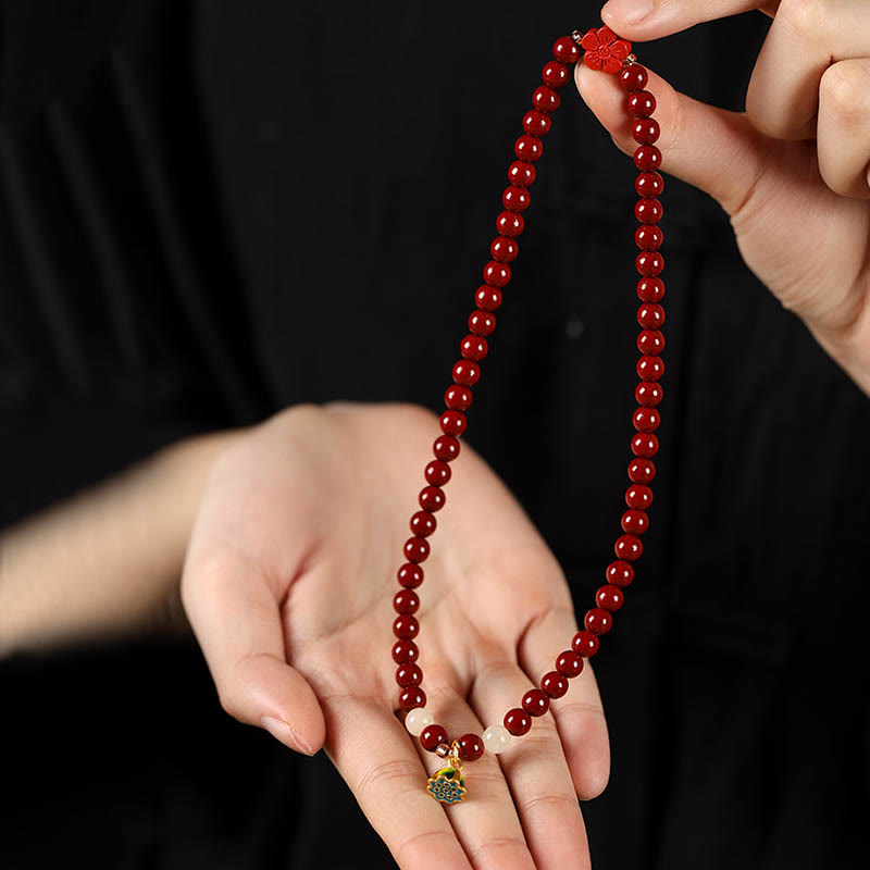 Braccialetto di benedizione a doppio giro con ciondolo di loto e cinabro Buddha Stones