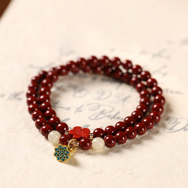 Braccialetto di benedizione a doppio giro con ciondolo di loto e cinabro Buddha Stones