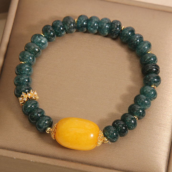 Braccialetto della fortuna con perline di abaco di giada verde Buddha Stones e topazio