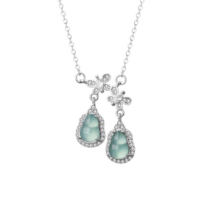 Collana con ciondolo a forma di farfalla con doppia zucca e giada verde in argento sterling 925 Buddha Stones