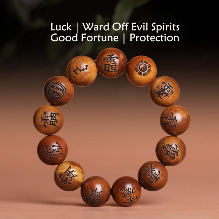Buddha Stones Fulmine Colpito Legno di Giuggiola Yin Yang Bagua Caratteri Tabù Taoisti Braccialetto di Protezione Inciso